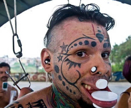 Ugly people, nasty piercings and the biggest asshole I have ever seen!