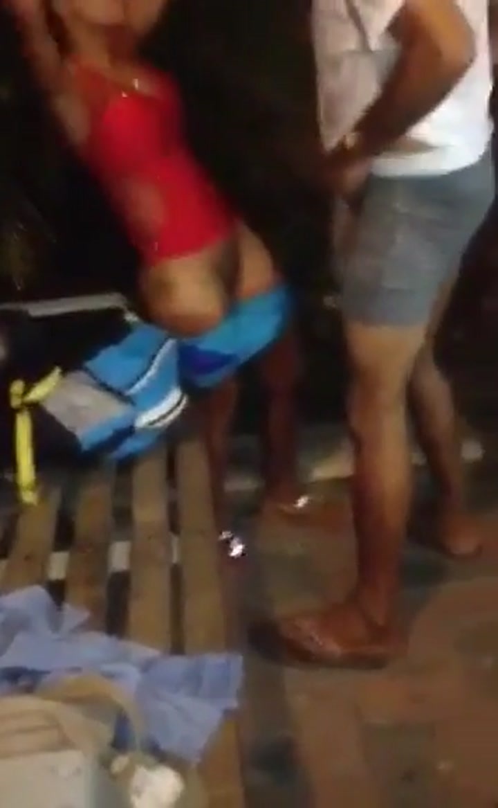 Old man and prostitute put on a show in public