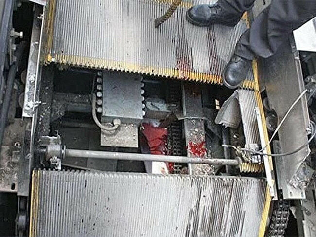 Escalator Repairman Crushed (aftermath photos)