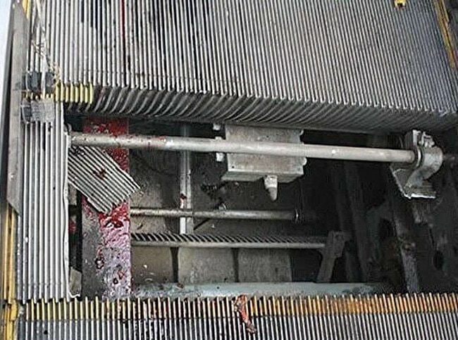 Escalator Repairman Crushed (aftermath photos)