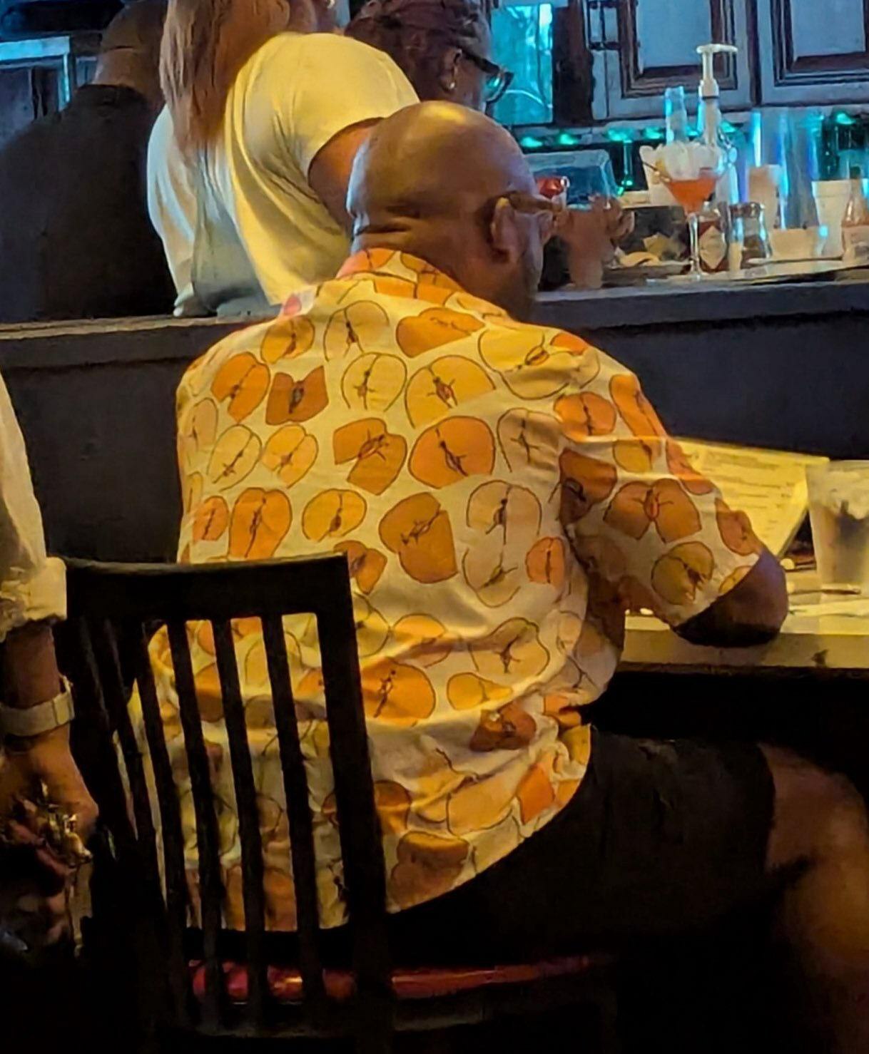 Look at this guy's shirt!