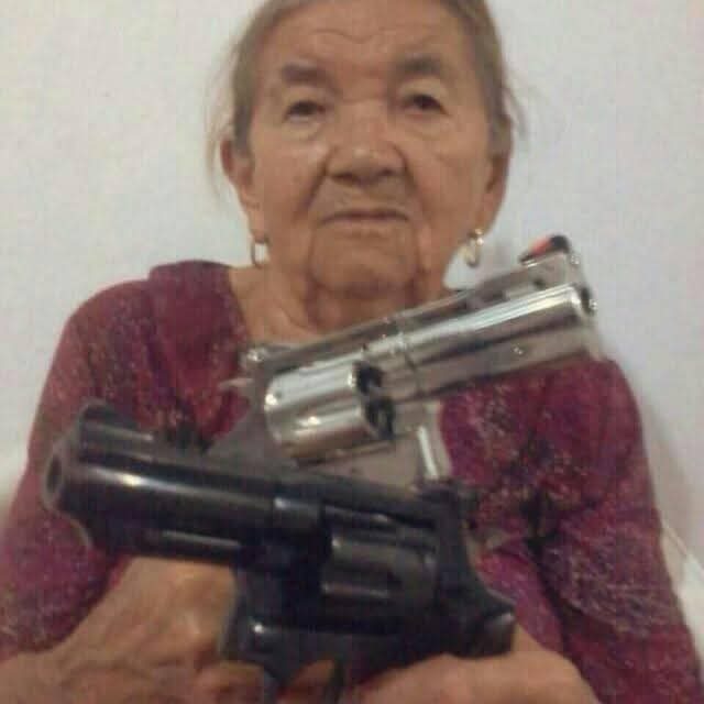 the old woman is armed