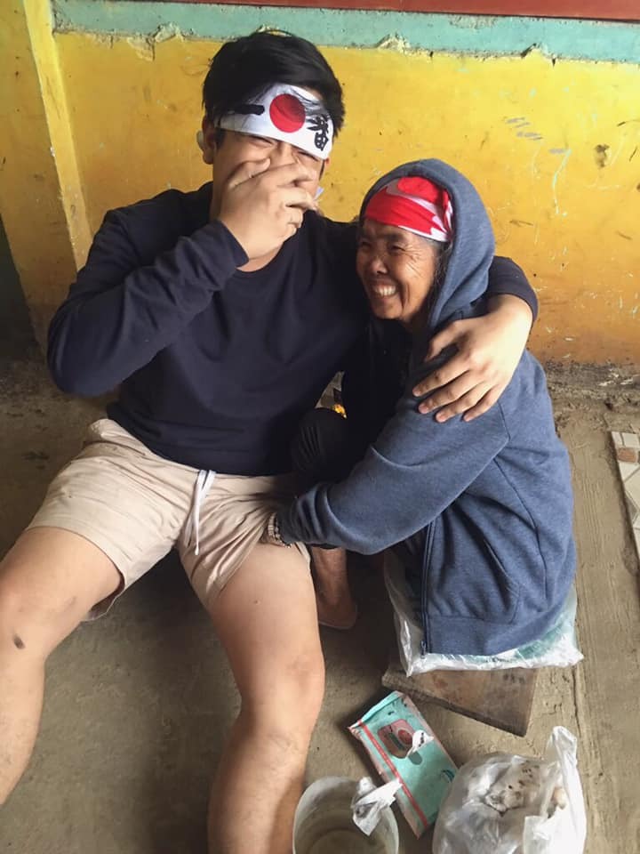 old woman touches men's penises