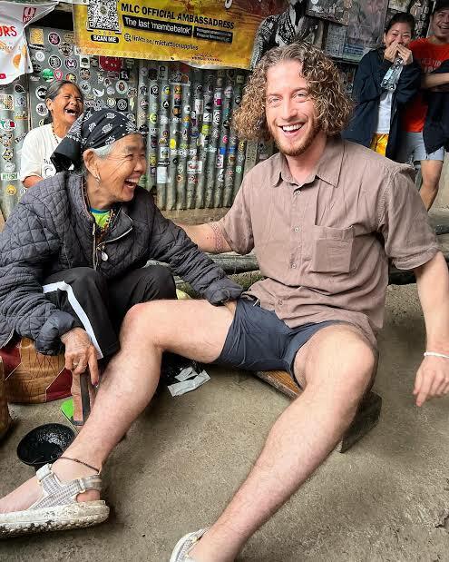 old woman touches men's penises