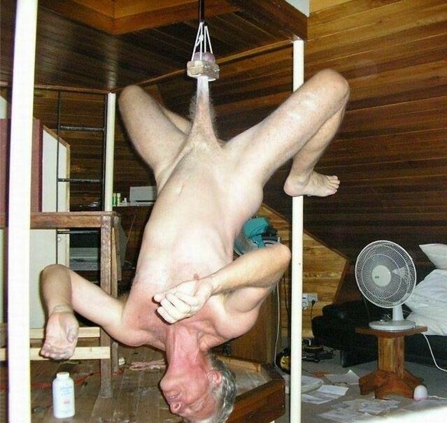 hanging by the testicles