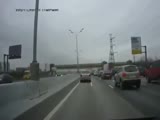 Silly Russian Driver Avoids Traffic Jam by Driving Onto Barrier