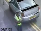 Traffic Warden gets kicked in the face hard!