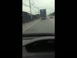 18 wheeler takes out a few cars and the driver gets his ass kicked