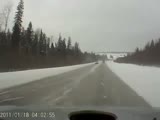A snow plough brings a suprise gift for passing driver