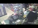 A deranged knife weilding female miscreant attempts to rob a petrol station at knife point