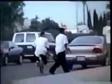 Skater beats the fuck out of an armed gang banger.