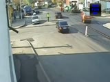 A stray bull charges a traffic cop in Romania