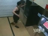 Drunk guy looses his shit with a ATM