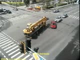 Accident! Crane advances intersection and cause an accident.