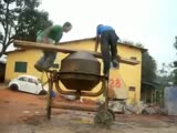 Workers in civil works make carousel with a mixer