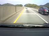 Two cars rollin down the highway after crash