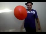 Moron fills ballon with gas almost sets himself on fire