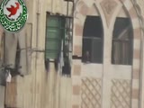 A Syrian Sunni Arab sharpshooter targets an assadist gunman.