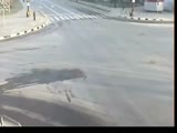 Pedestrian goes airborne after hit by a car