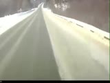 Speeding car on slippery road crashes