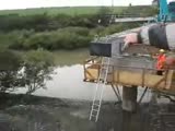 Crane working on a bridge crashes.
