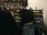 Worker suffocated stuck in a machine.