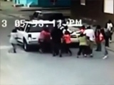 Woman Reverses Through A Group Of Females Running Them Over During Argument