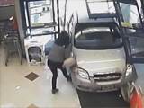 Woman rams her car into the shopping entrance