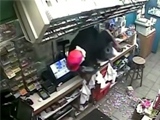 Armed Robbery At A Texas Store - Store Clerk Shoots One Of The Robbers Hiding Behind The Counter