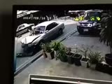Scooter Rider Has No Problem Crashing Head On Into Car