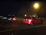 Two Idiots Lining Up For A Drag Race On The Highway Get An Unexpected Surprise