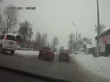 Man in a hurry tries to cross the road gets somersaulted by a car.