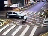 Motorcyclist Rides Straight Under The Wheels Of A Car And Amazingly Survives