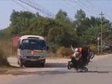 Two bikers in Thailand crash in a strange head on collision.