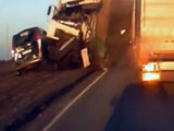 Truck Ploughs Through Man Standing Behind His Broken Down Minibus