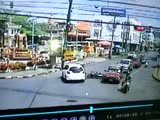 Oblivious Couple On A Scooter Taken Down By Oblivious Car