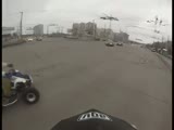 Motorrider and his bike sliding over the road crash into an ATV