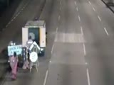 Motorcyclist Runs Into The Back Of A Road Crew Truck!