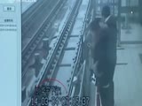 Chick Faints And Falls Face First On A Train Platform