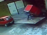 Man Unloading A Truck Gets Crushed By A Giant Red Box