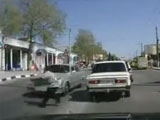 Small man is violently hit by a car when crossing the road