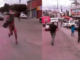 Man who got cheated on by his wife chases her naked lover down a street