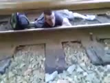 Idiot Gets Trapped Underneath A Train And Fears For His Life