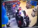 Robber shoots a security guard at close range and almost hitting two girls.