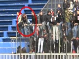 Serbian soccer fan makes a three meter fall from a tribune.