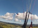 Paraglider collides with an hang-glider
