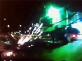 Raw video of a gunman unloading an AK47 on a police car.