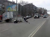 A Biker Slams Hard And Fast Into A Turning Truck