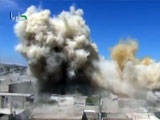 A very close call for a cameraman filming in Syria