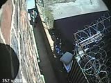 Postman caught on CCTV taking a dump in the alley